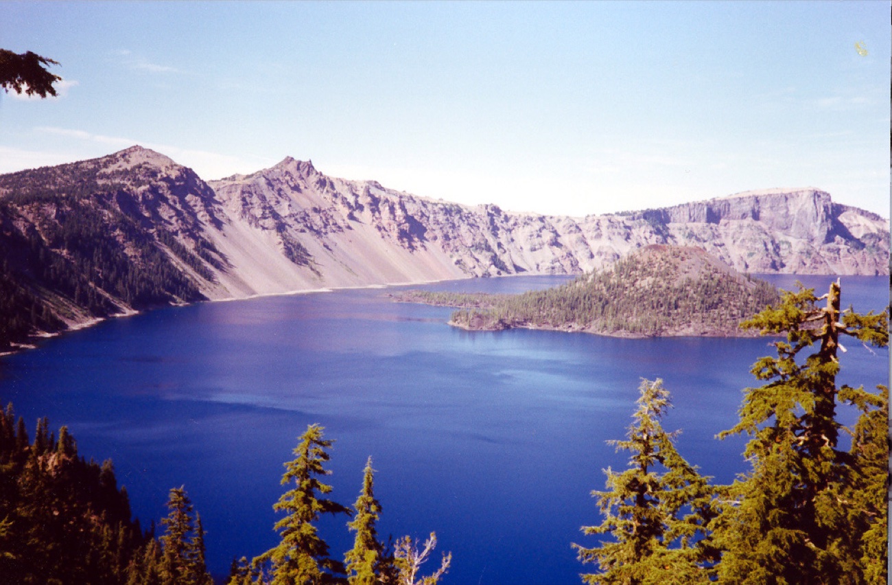Crater Lake in Oregon with Wizard Island, a blue so unnatural I have never seen it anywhere else again